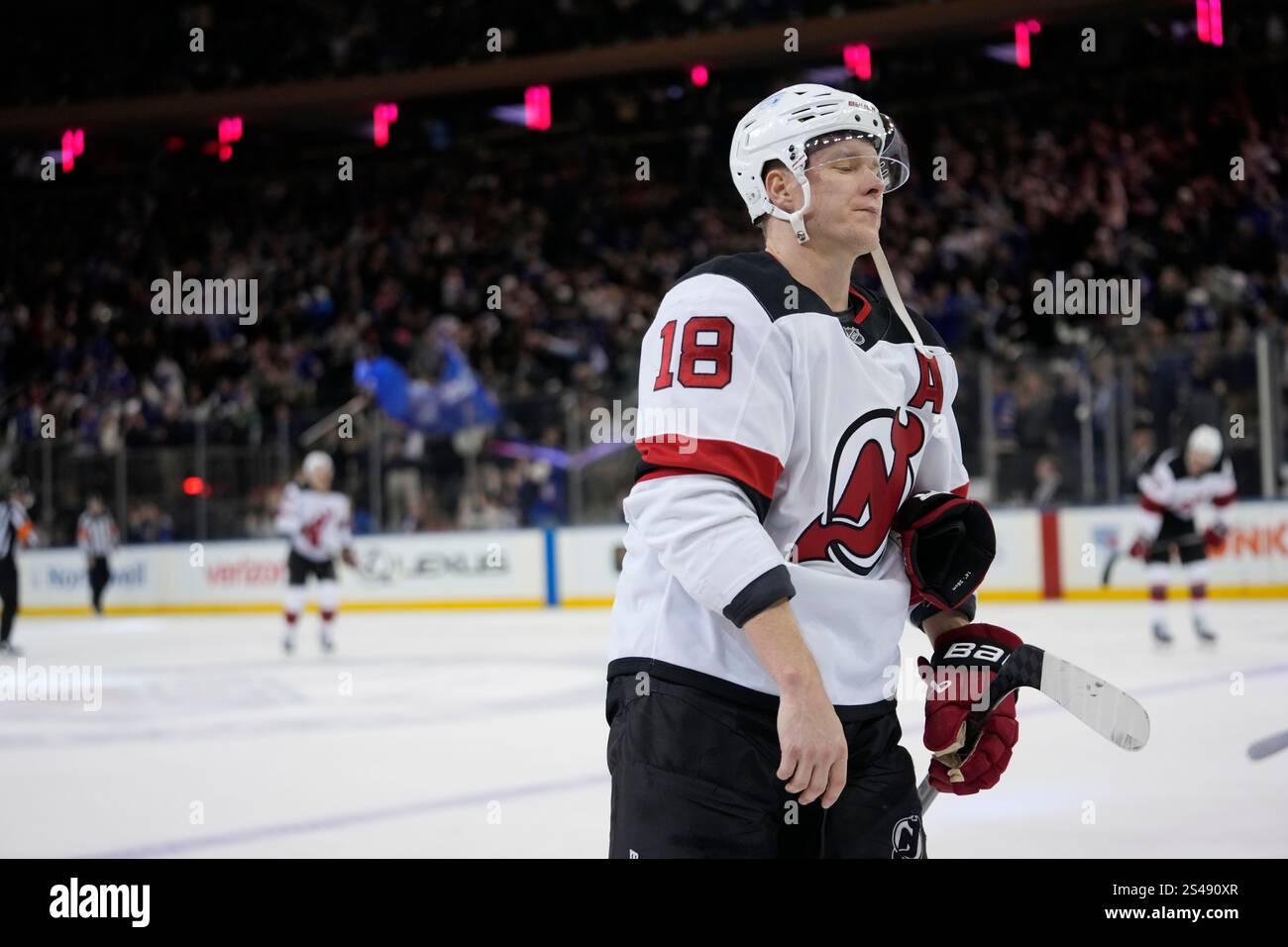 New Jersey Devils' Ondrej Palat (18) leaves the ice after an NHL hockey