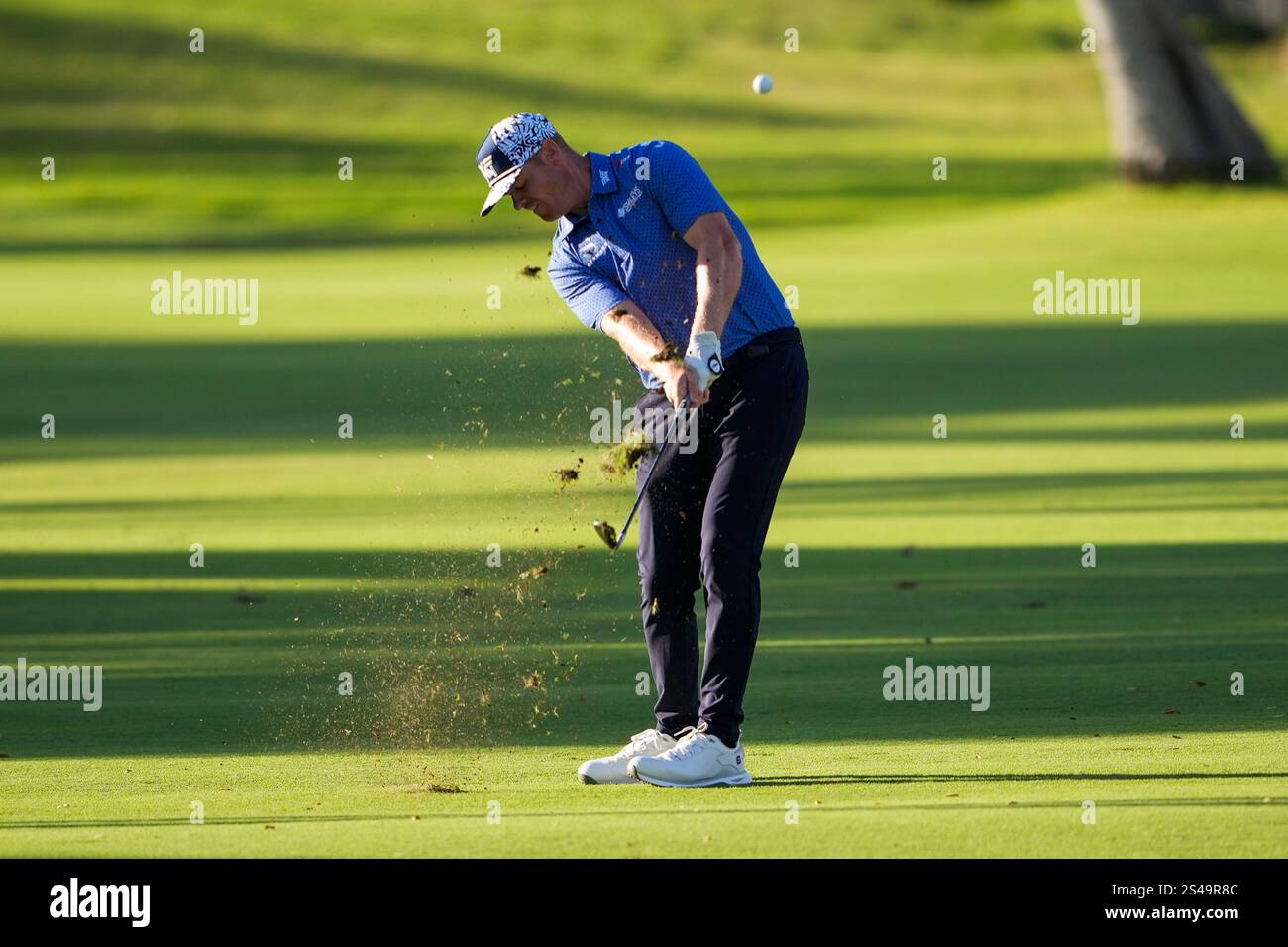 Patrick Fishburn hits from the ninth fairway during the second round of