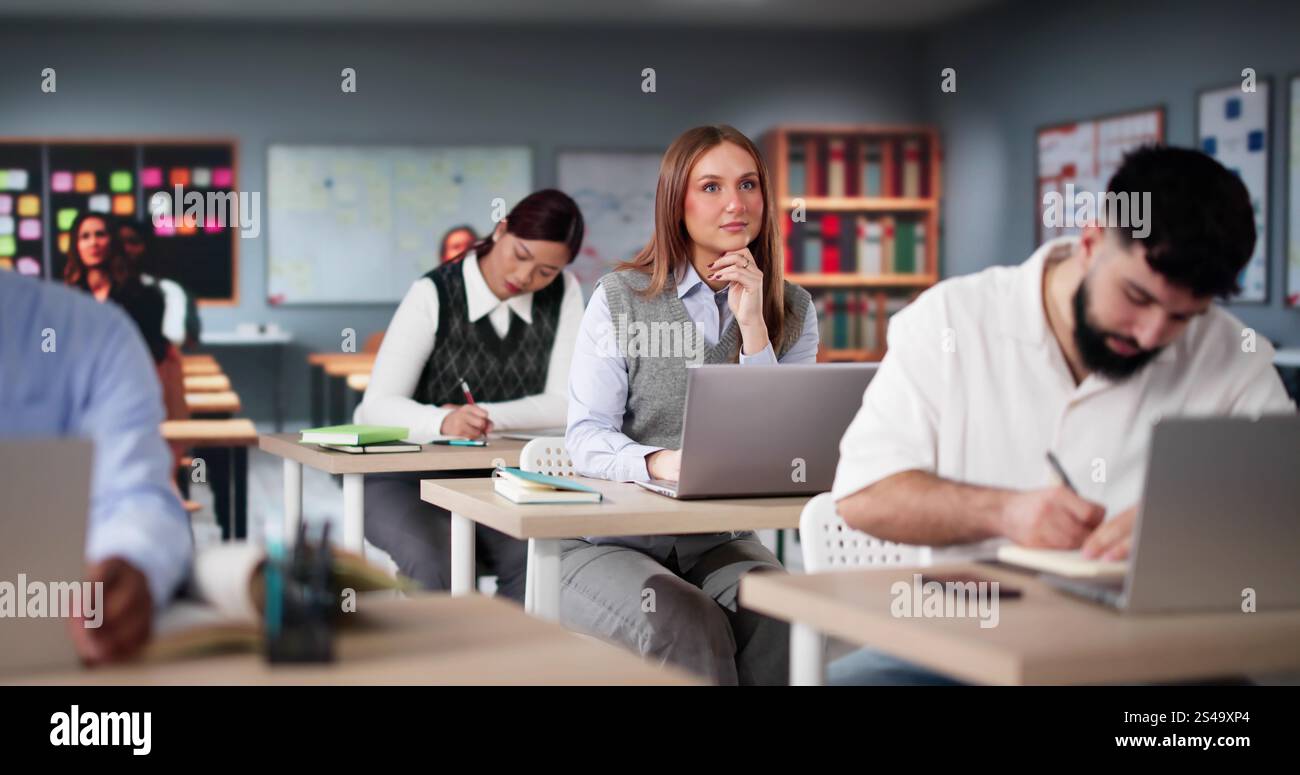 Diverse College Students Group In Classroom With Laptop Computers Stock Photo
