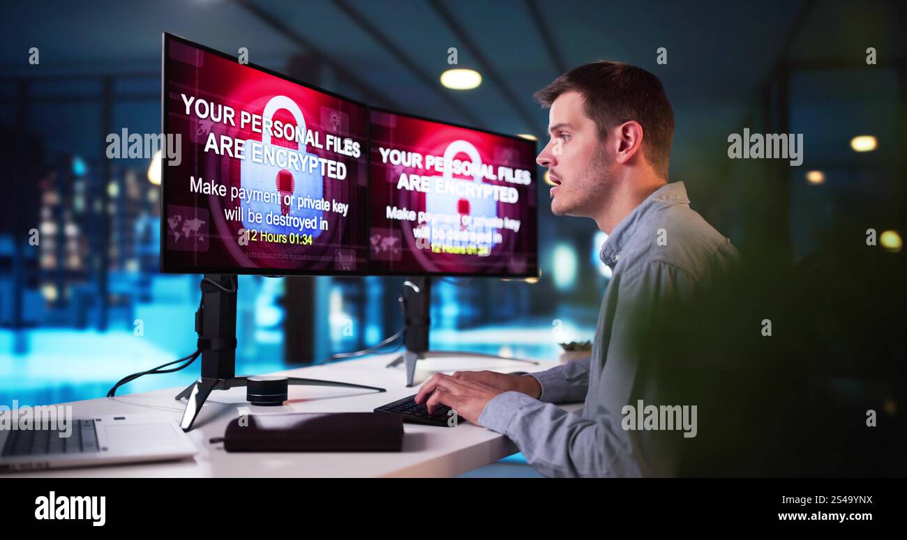 Ransomware Malware Cyber Attack On Business Computer Stock Photo