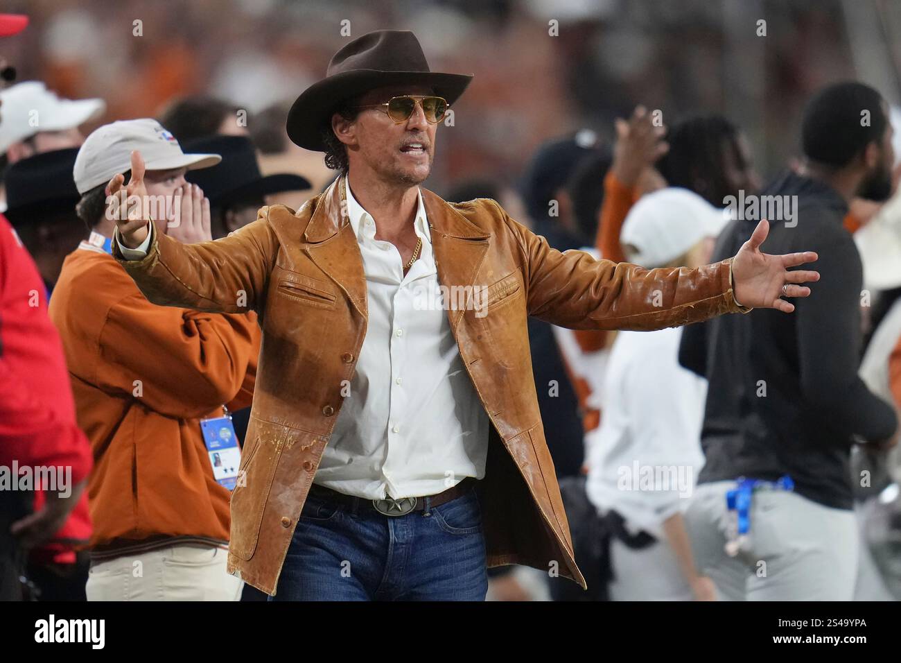Actor Matthew McConaughey reacts during the second half of the Cotton