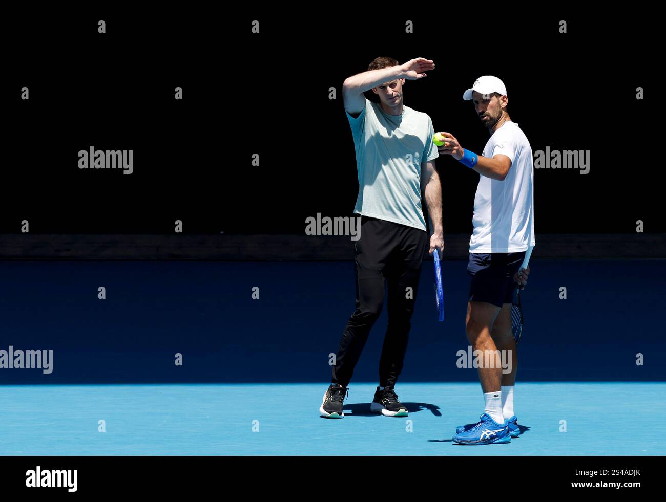 (250111) MELBOURNE, Jan. 11, 2025 (Xinhua) Novak Djokovic (R) of