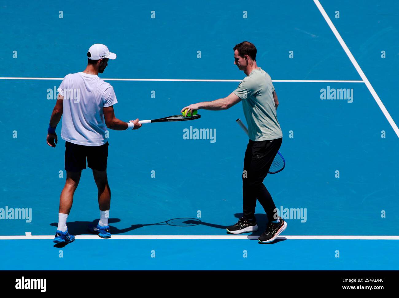 (250111) MELBOURNE, Jan. 11, 2025 (Xinhua) Novak Djokovic (L) of