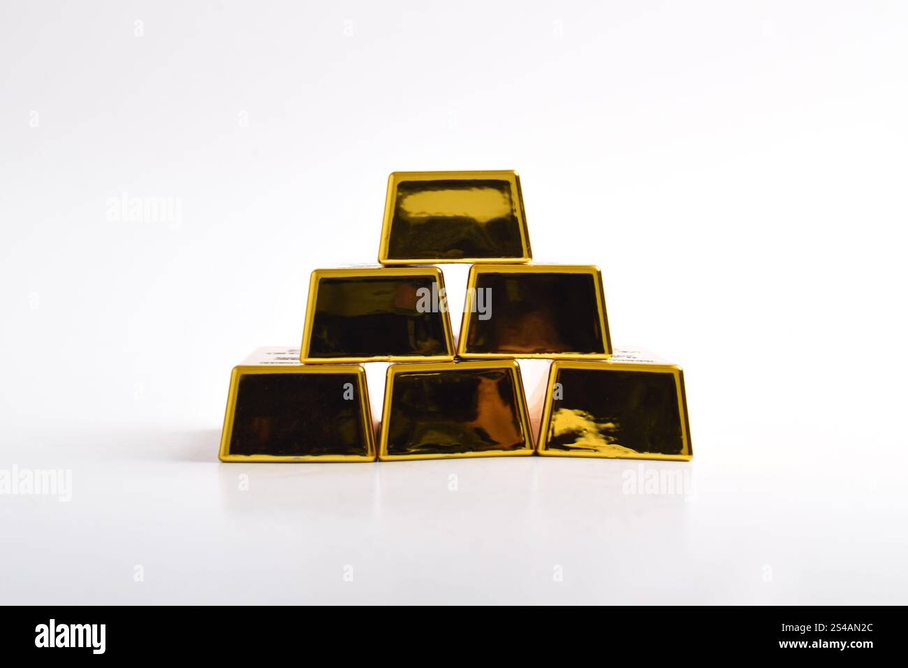 Stack of shiny gold bars isolated on white background Stock Photo - Alamy