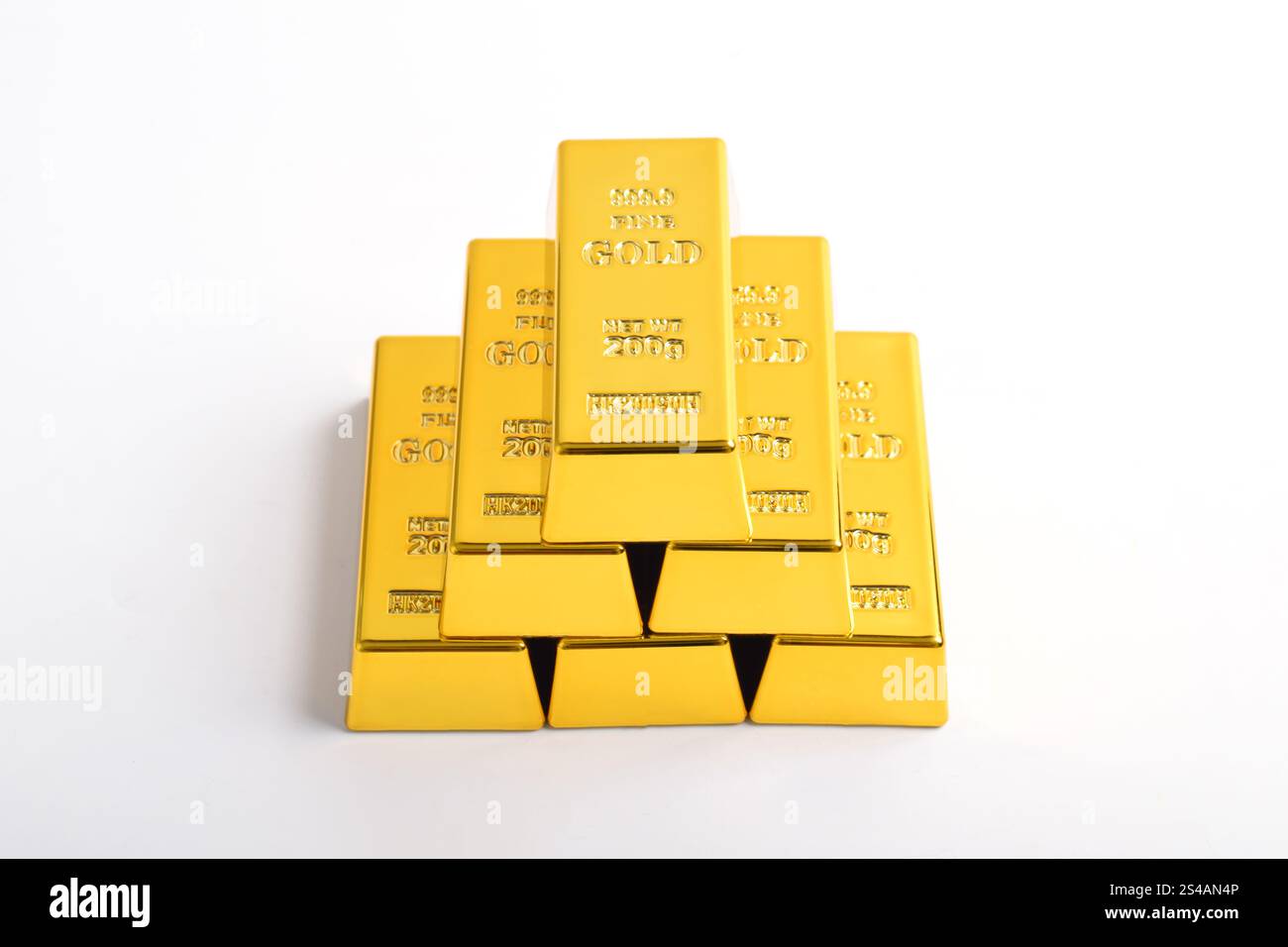 Stack of shiny gold bars isolated on white background Stock Photo - Alamy