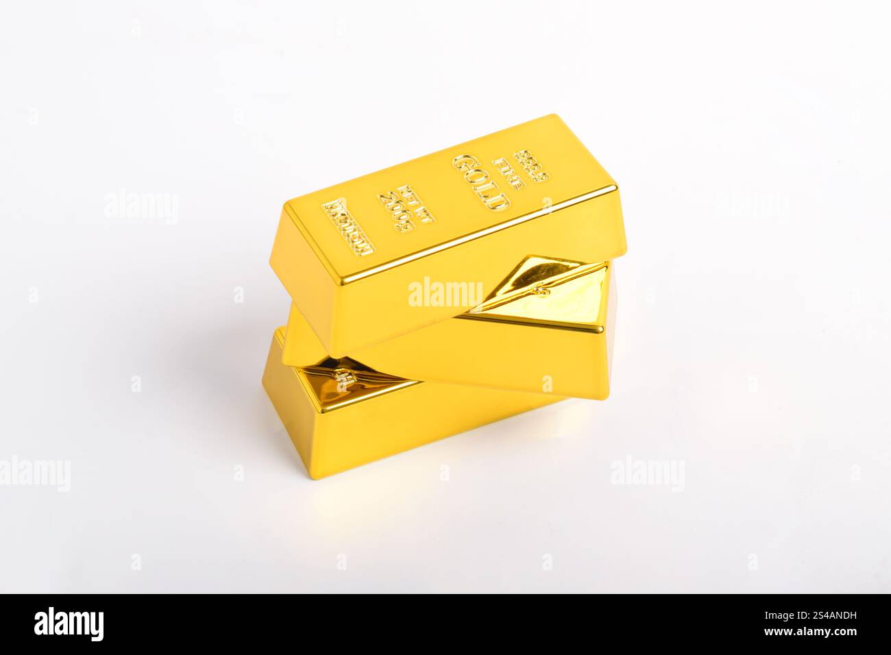 Stack of shiny gold bars isolated on white background Stock Photo - Alamy