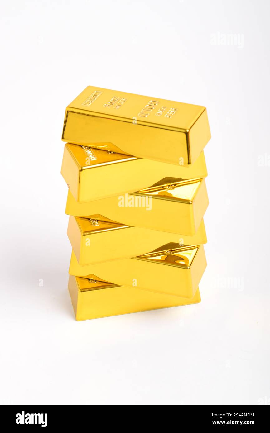 Stack of shiny gold bars isolated on white background Stock Photo - Alamy