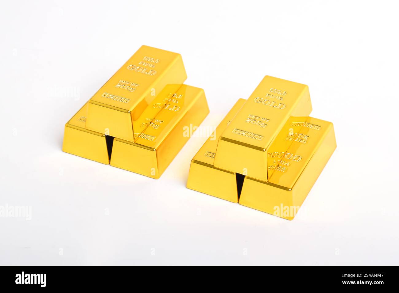 Stack of shiny gold bars isolated on white background Stock Photo - Alamy