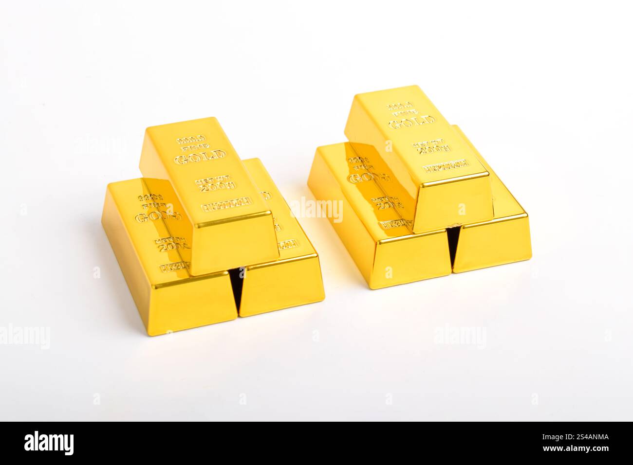 Stack of shiny gold bars isolated on white background Stock Photo - Alamy