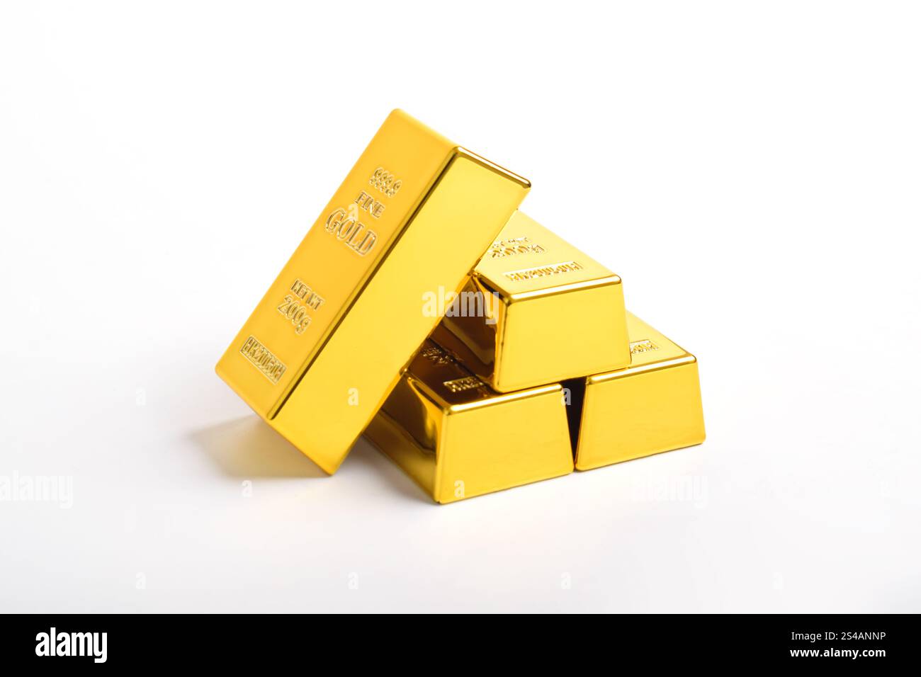Stack of shiny gold bars isolated on white background Stock Photo - Alamy