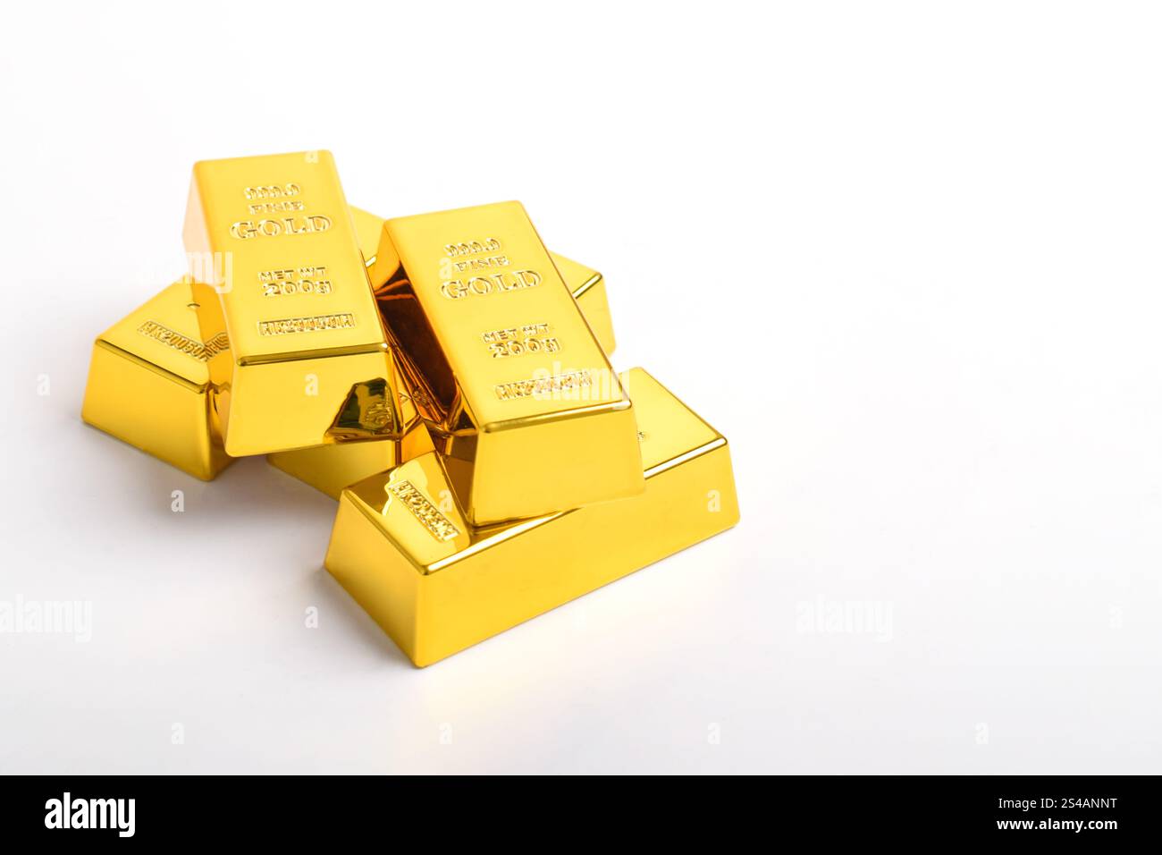 Stack of shiny gold bars isolated on white background Stock Photo - Alamy