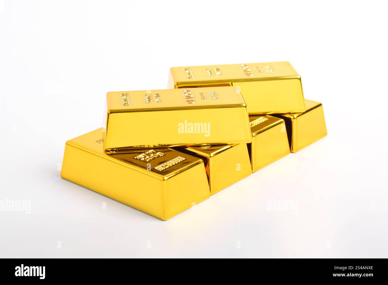 Many shiny gold bars isolated on white background Stock Photo - Alamy