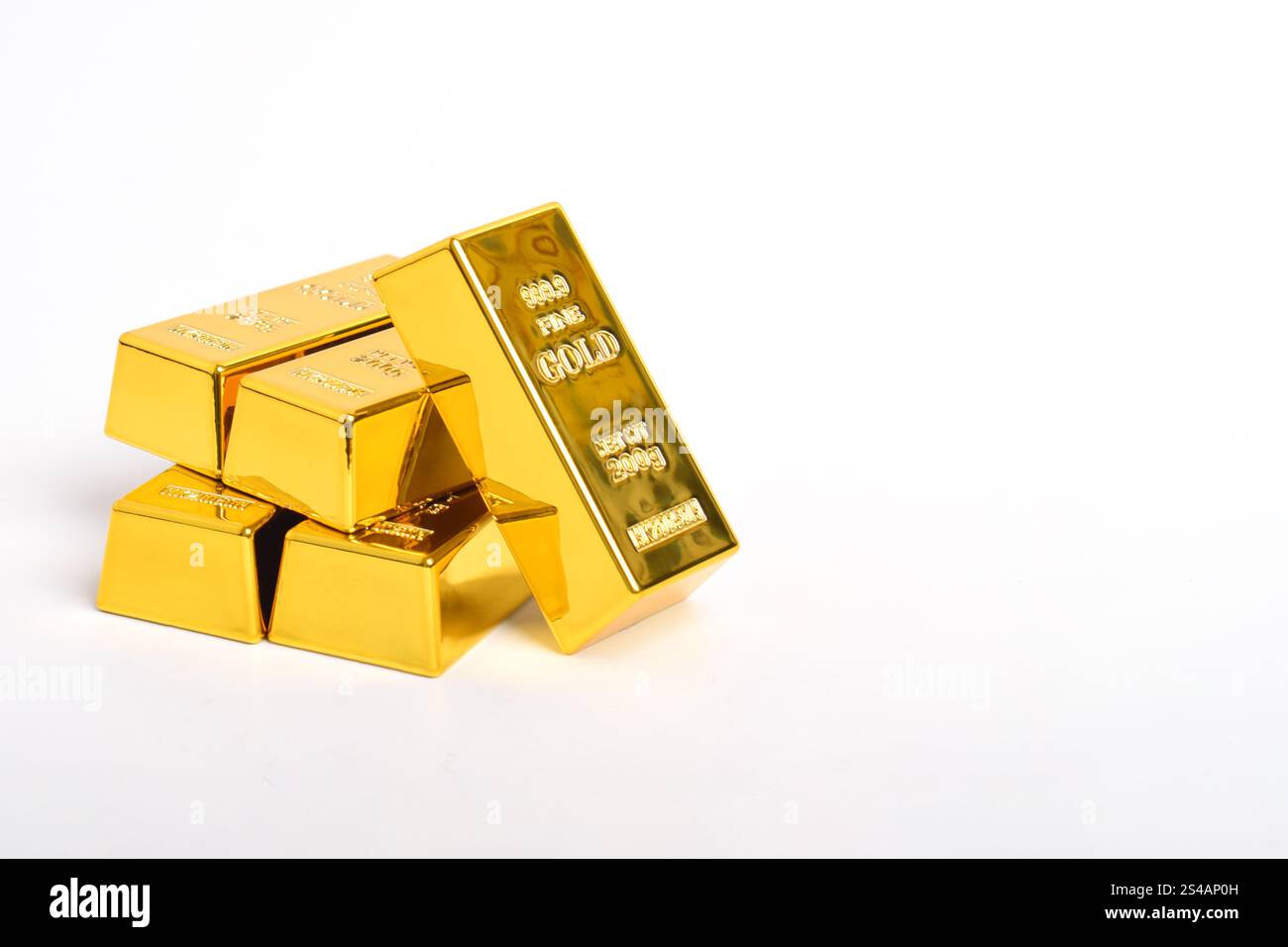 Many shiny gold bars isolated on white background Stock Photo - Alamy