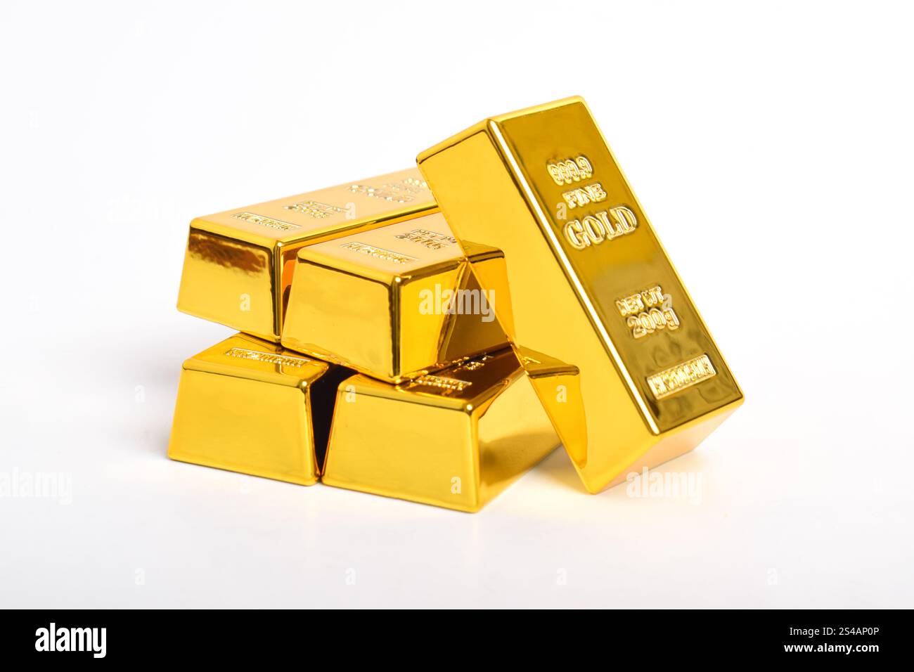 Many shiny gold bars isolated on white background Stock Photo - Alamy