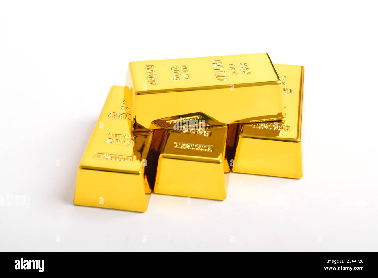 Stack of shiny gold bars isolated on white background Stock Photo - Alamy