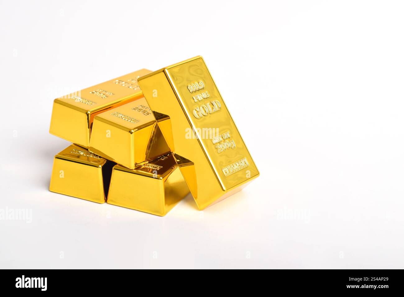 Many shiny gold bars isolated on white background Stock Photo - Alamy