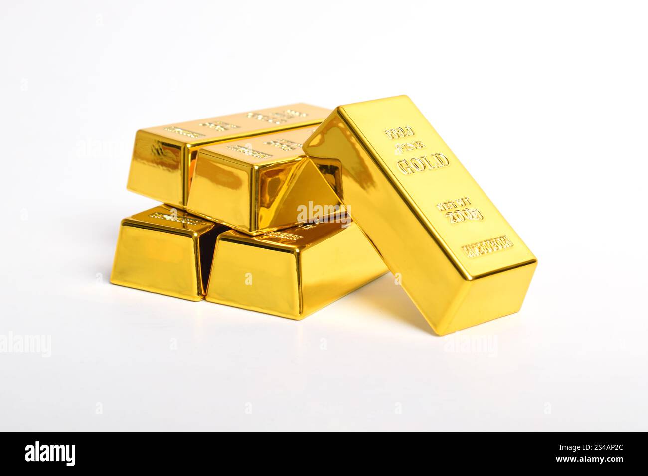Many shiny gold bars isolated on white background Stock Photo - Alamy