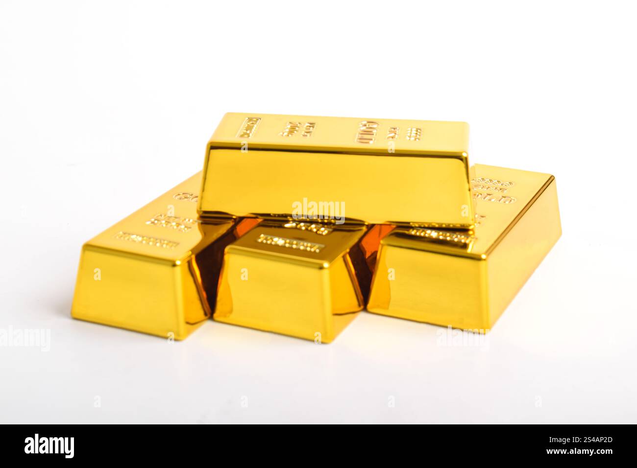 Stack of shiny gold bars isolated on white background Stock Photo - Alamy