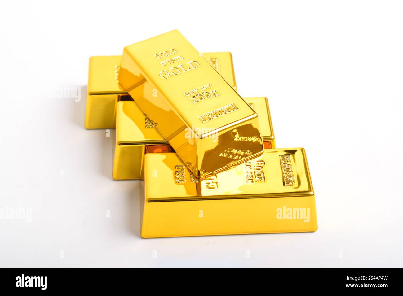 Stack of shiny gold bars isolated on white background Stock Photo - Alamy
