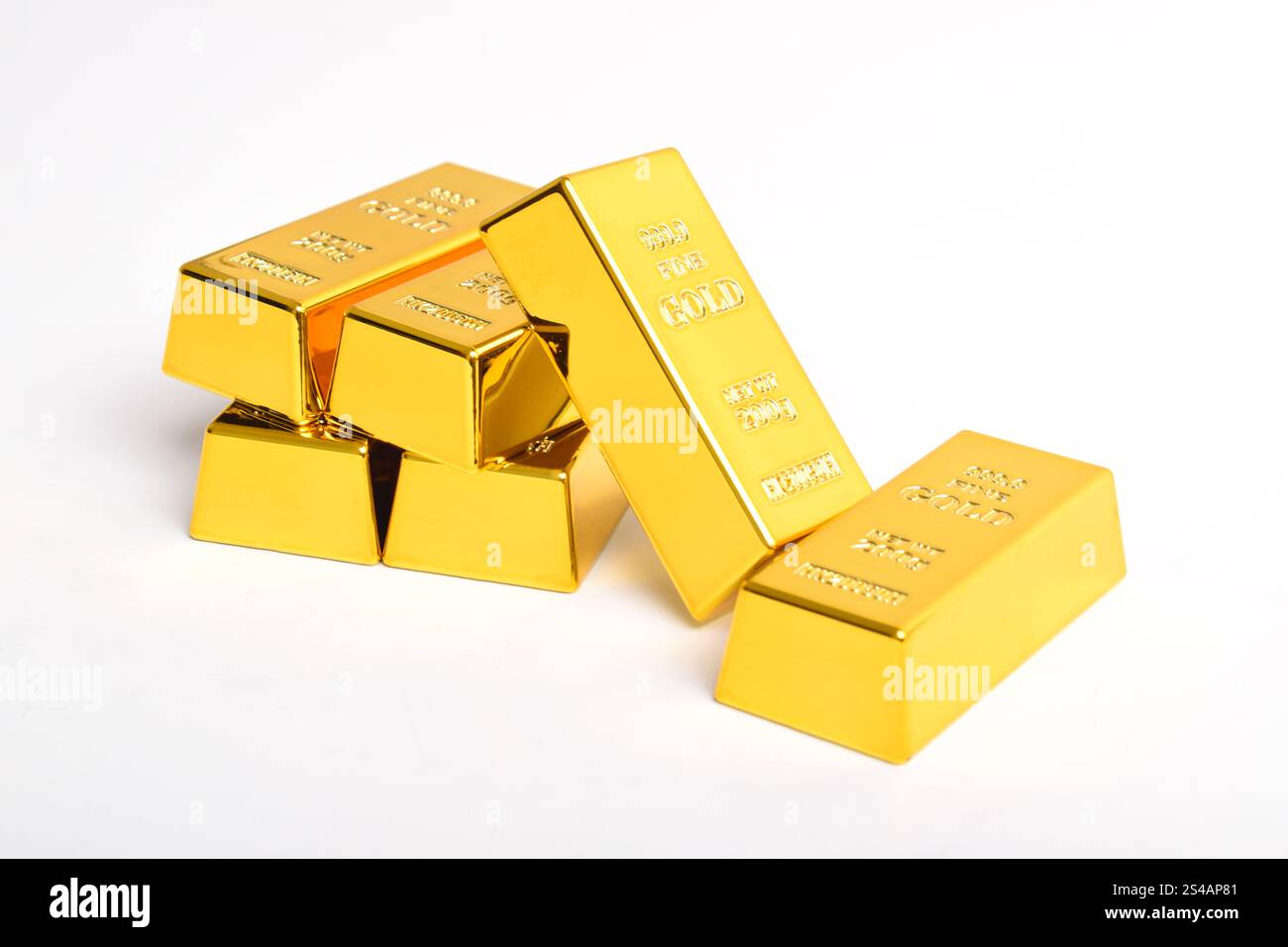 Many shiny gold bars isolated on white background Stock Photo - Alamy