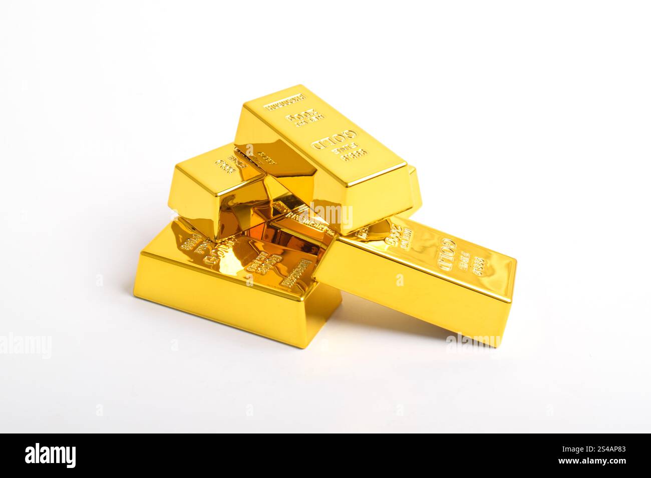 Many shiny gold bars isolated on white background Stock Photo - Alamy