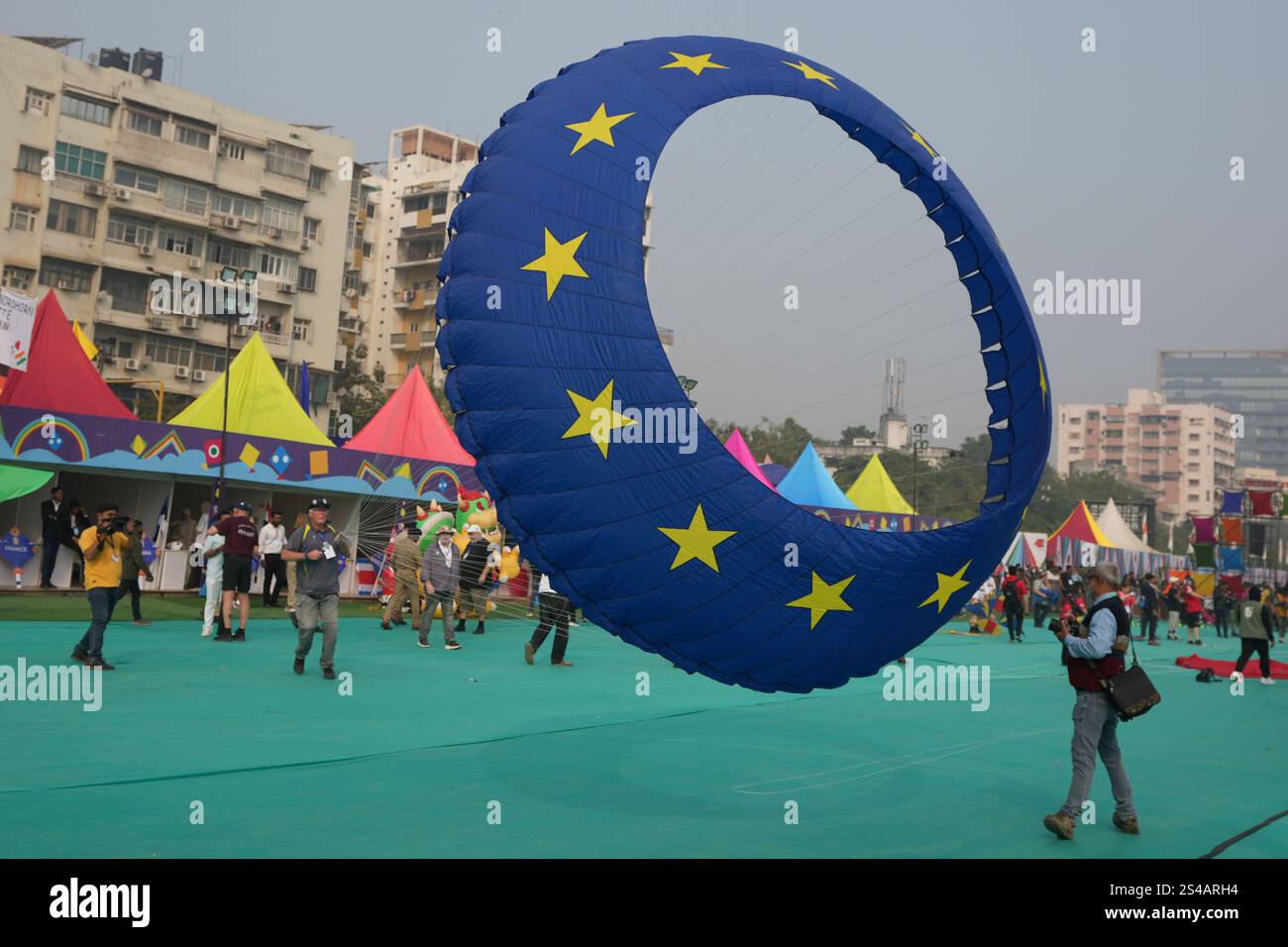 A participant flies his kite during an International kite festival in