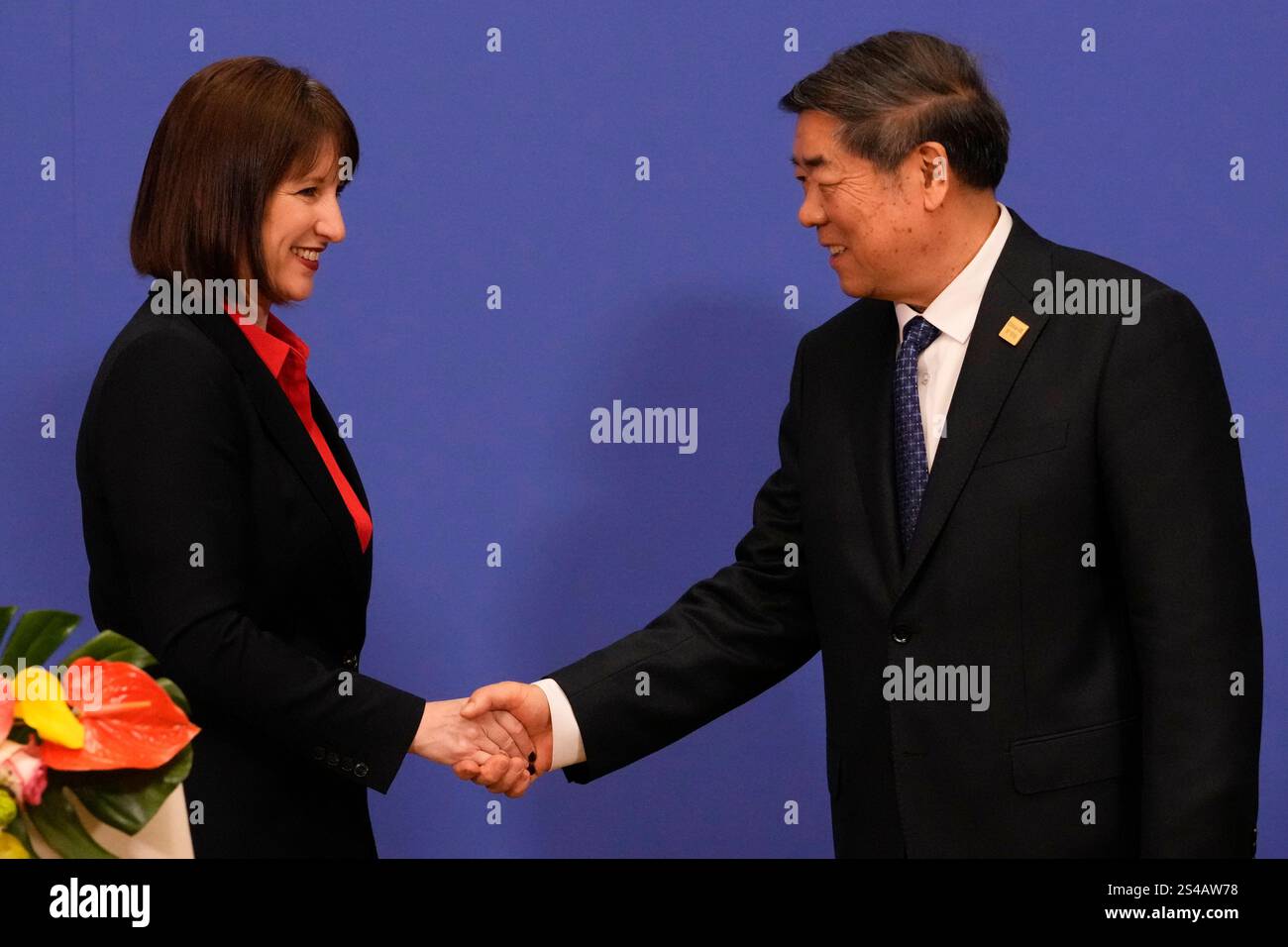 Rachel Reeves Beijing British Chancellor of the Exchequer Rachel Reeves, left, shakes hands ...