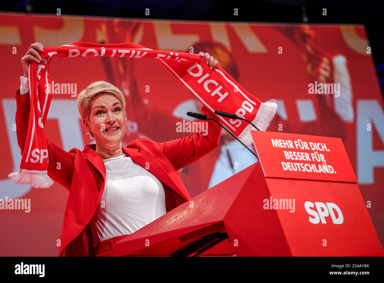 Berlin, Germany. 11th Jan, 2025. Manuela Schwesig (SPD), Minister President of Mecklenburg-Vorpommern, speaks at the extraordinary SPD federal party conference and holds a red scarf. The focus of the party conference is the nomination of Scholz as candidate for chancellor. Credit: Kay Nietfeld/dpa/Alamy Live News Stock Photo