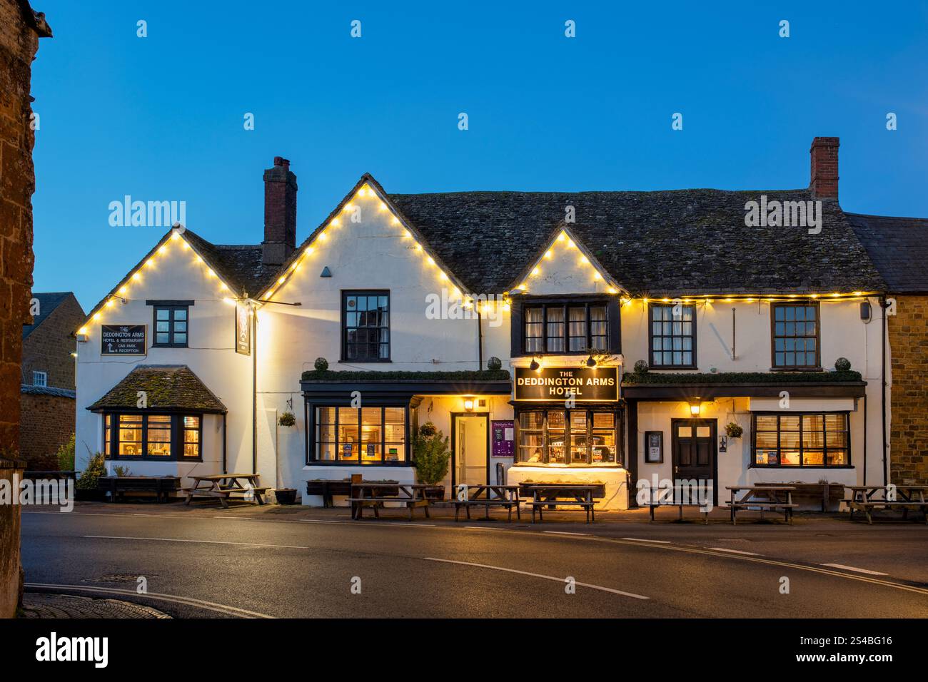 The Deddington Arms Hotel at dusk in winter. Deddington, Oxfordshire, England Stock Photo