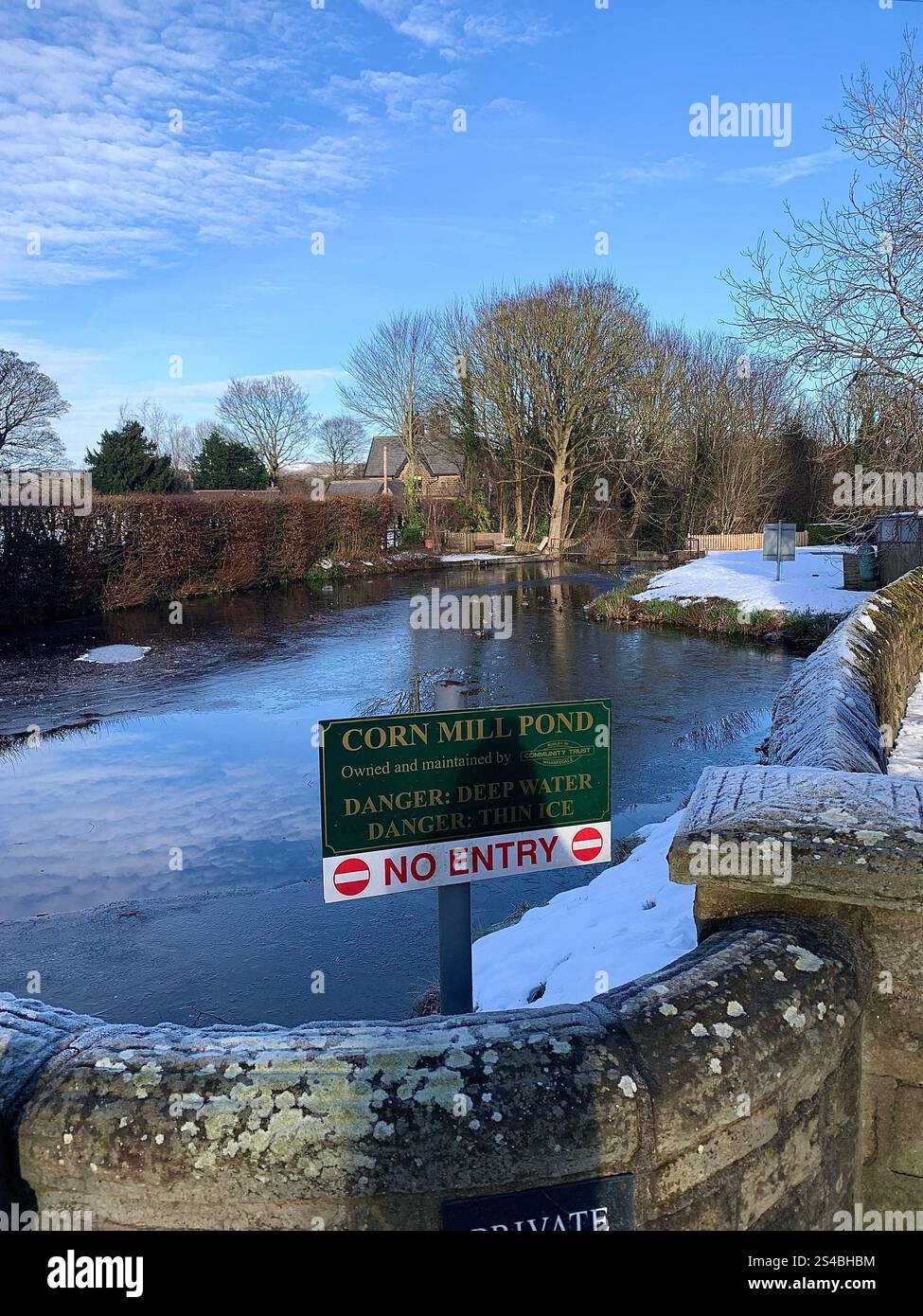 Burley in Wharfedale UK Yorkshire England Village Town people Winter Autumn Spring cold weather ice snow stone houses old Victorian design gardens - Smartphone Captured Stock Image