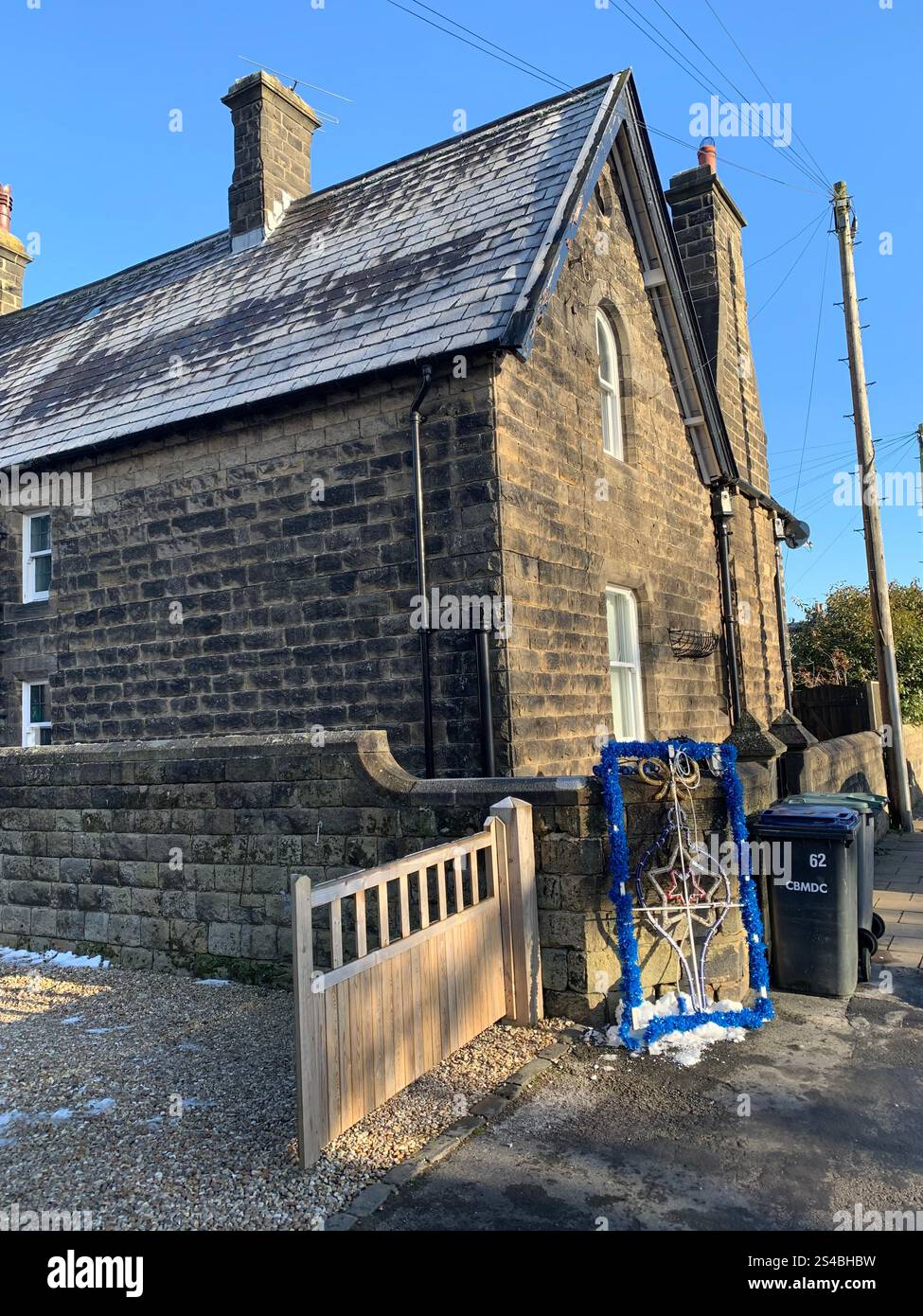 Burley in Wharfedale UK Yorkshire England Village Town people Winter Autumn Spring cold weather ice snow stone houses old Victorian design gardens - Smartphone Captured Stock Image