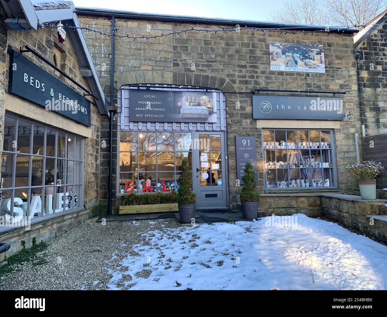 Burley in Wharfedale UK Yorkshire England Village Town people Winter Autumn Spring cold weather ice snow stone houses old Victorian design gardens - Smartphone Captured Stock Image