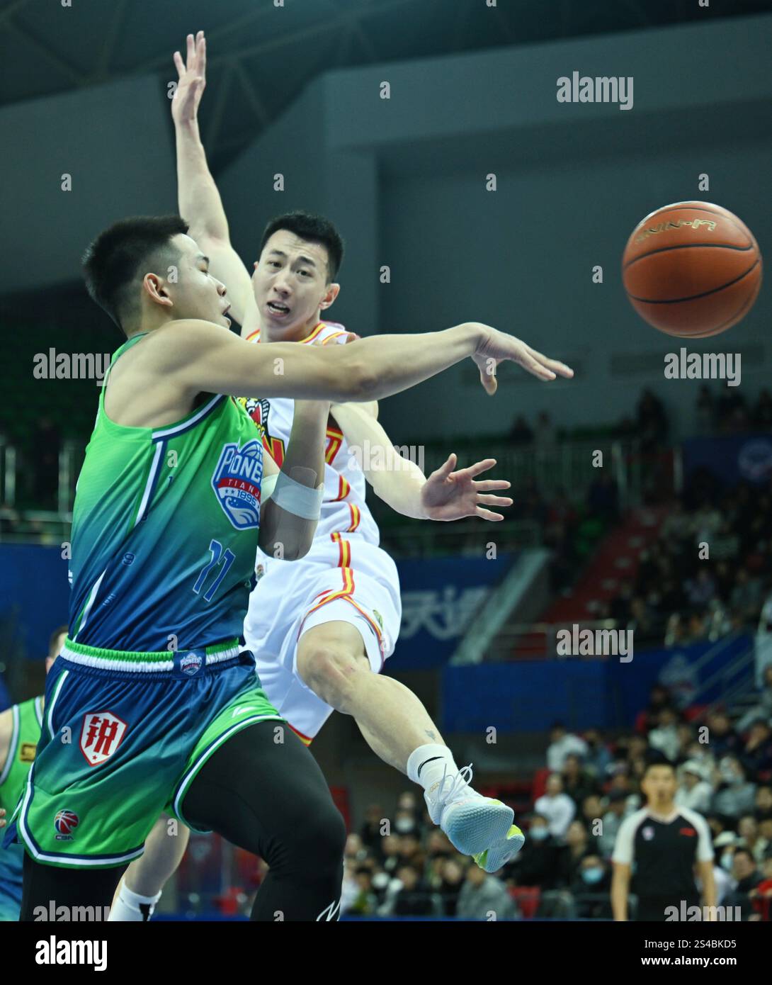 Tianjin, China. 11th Jan, 2025. Sun Chengxin (L) of Tianjin Pioneers ...