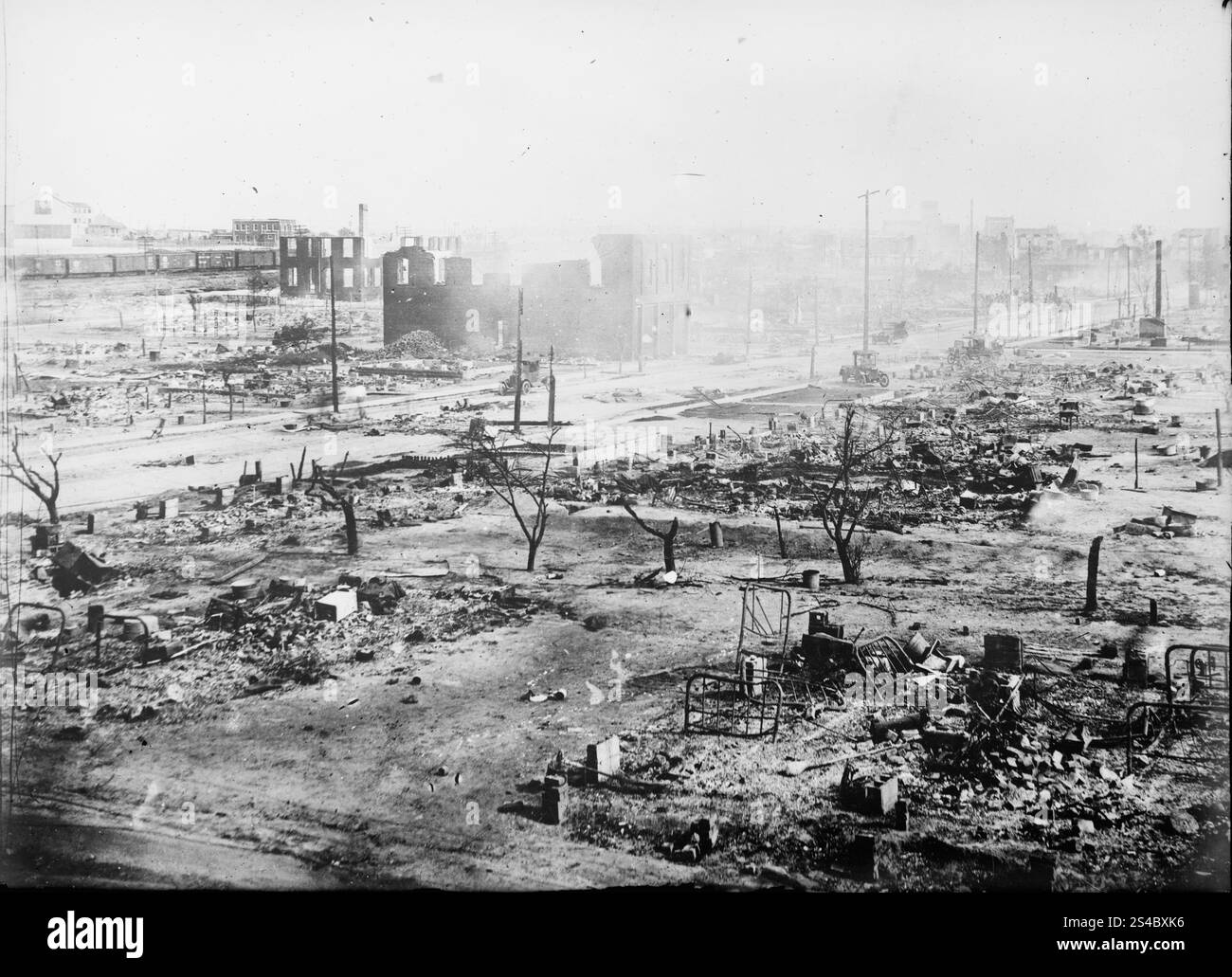 Ruins after the race riots, Tulsa, Oklahoma.  June 1921.   Archive Photograph shows leveled neighborhood after the Tulsa Race Massacre, also called Tulsa Race Riot, when a white mob attacked the predominantly African American Greenwood neighborhood of Tulsa, Oklahoma. Source:  American National Red Cross photograph collection (LOC) Stock Photo