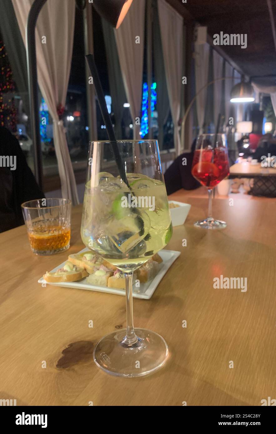 Pre-dinner drinks in a cocktail bar - Smartphone Captured Stock Image