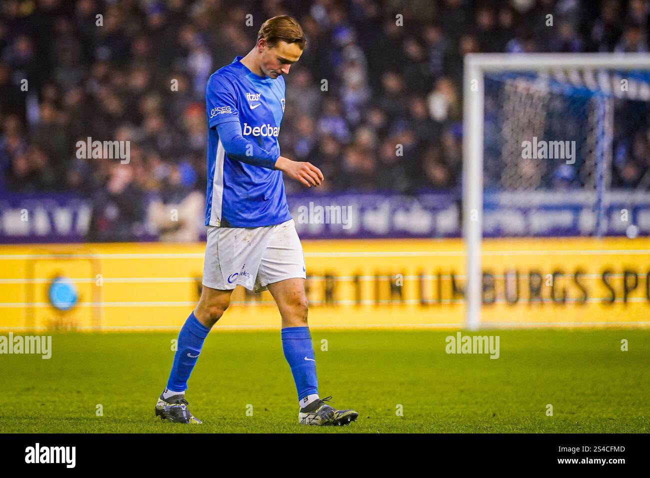 Genk, Belgium. 11th Jan, 2025. GENK, BELGIUM - JANUARY 11: Matte Smets of KRC Genk looks dejected after receiving a red card during the Jupiler Pro League match between KRC Genk and OH Leuven at Cegeka Arena on January 11, 2025 in Genk, Belgium. (Photo by Jeroen Meuwsen/Orange Pictures) Credit: Orange Pics BV/Alamy Live News Stock Photo