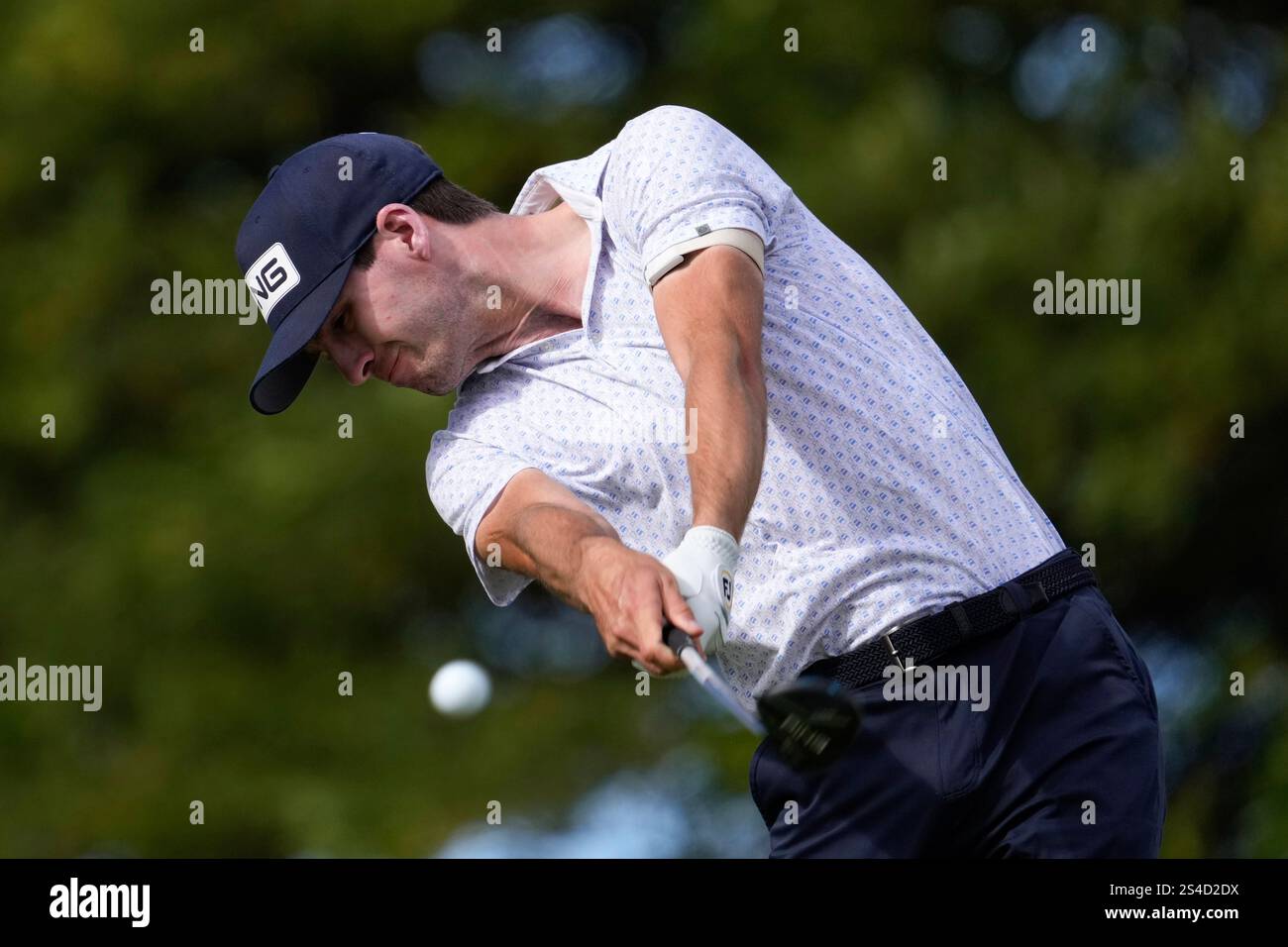 Alex Smalley hits a tee shot on the second hole during the third round