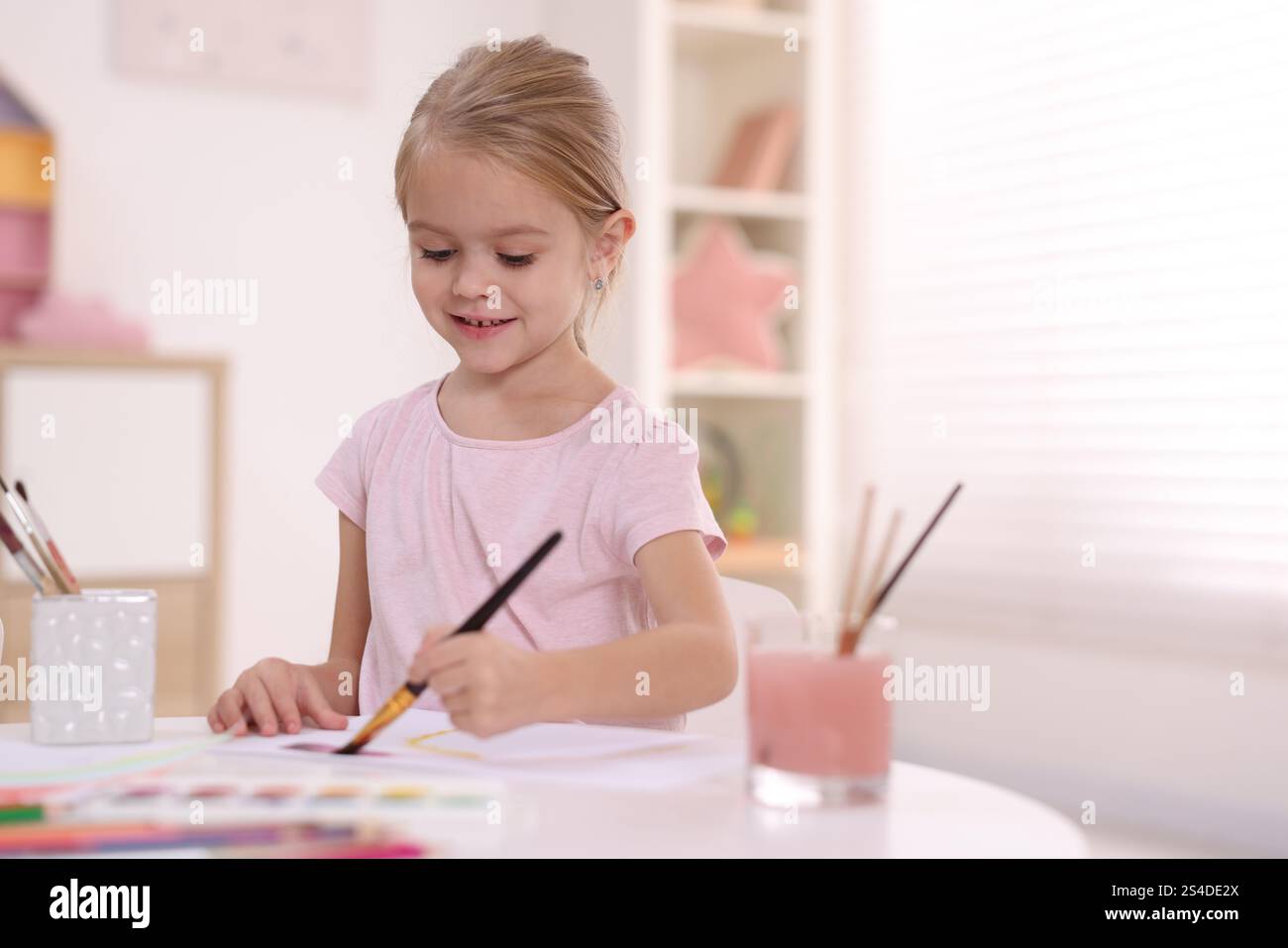 little student girl drawing at school Stock Photo - Alamy