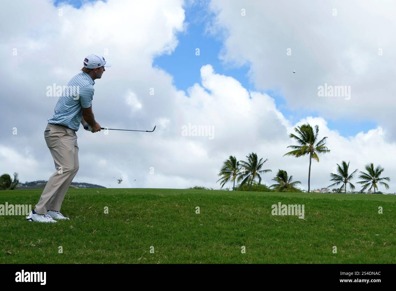 Russell Henley hits onto the 13th green during the third round of the ...