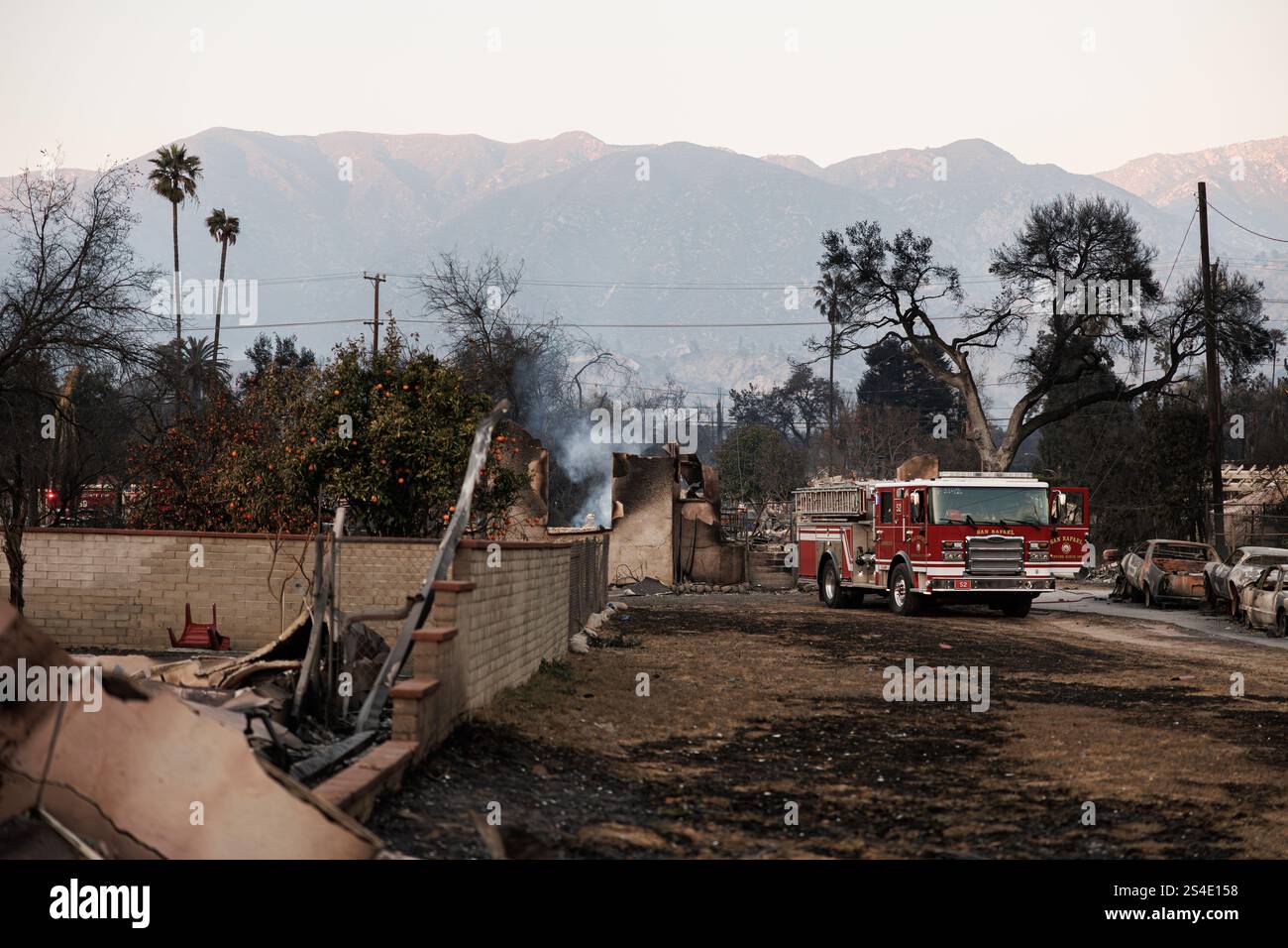Fire crews work on putting out hot spots in Altadena after teh Eaton ...
