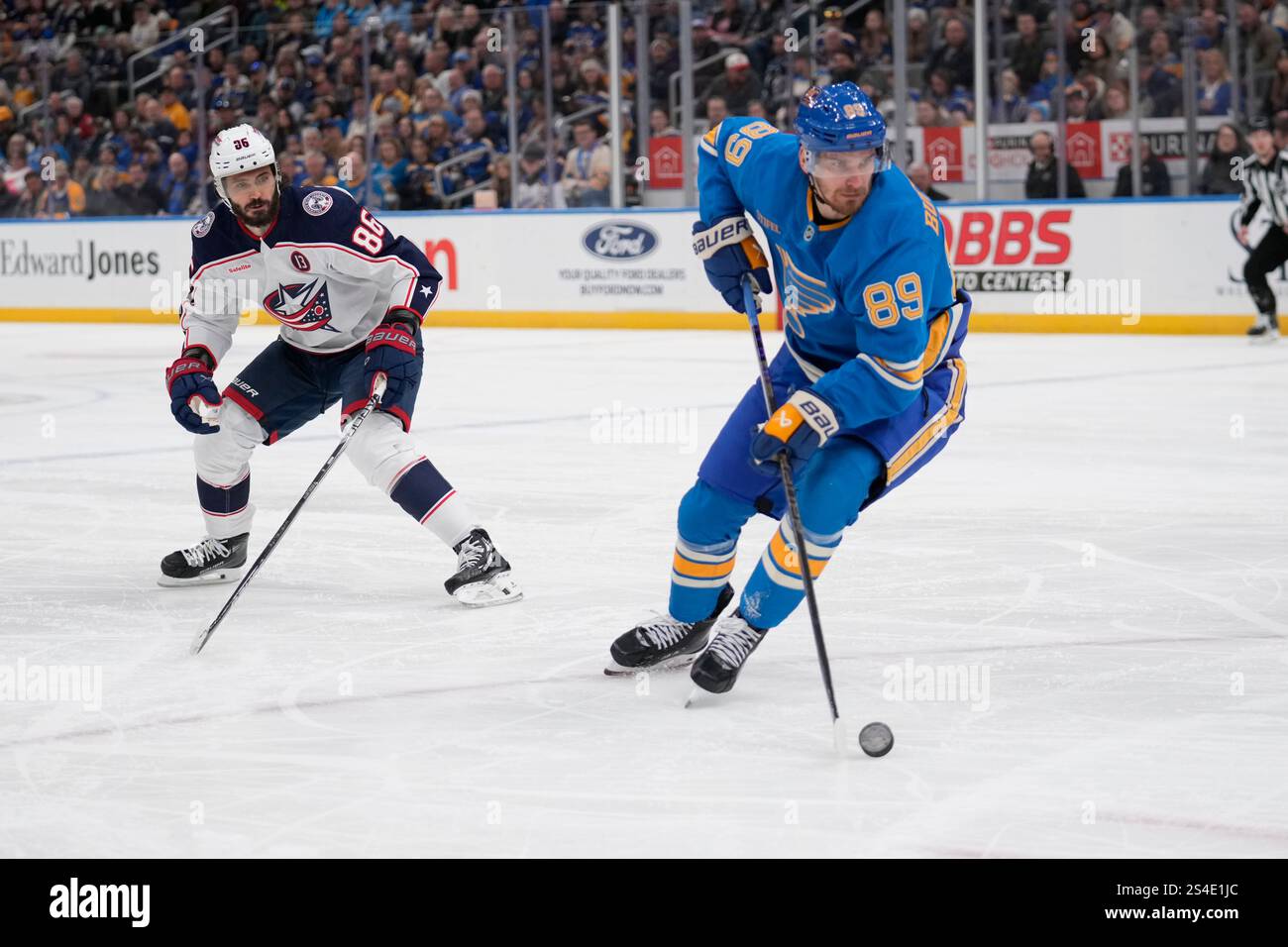 Marchenko 86 St. Louis Blues' Pavel Buchnevich (89) controls the puck as Columbus ...