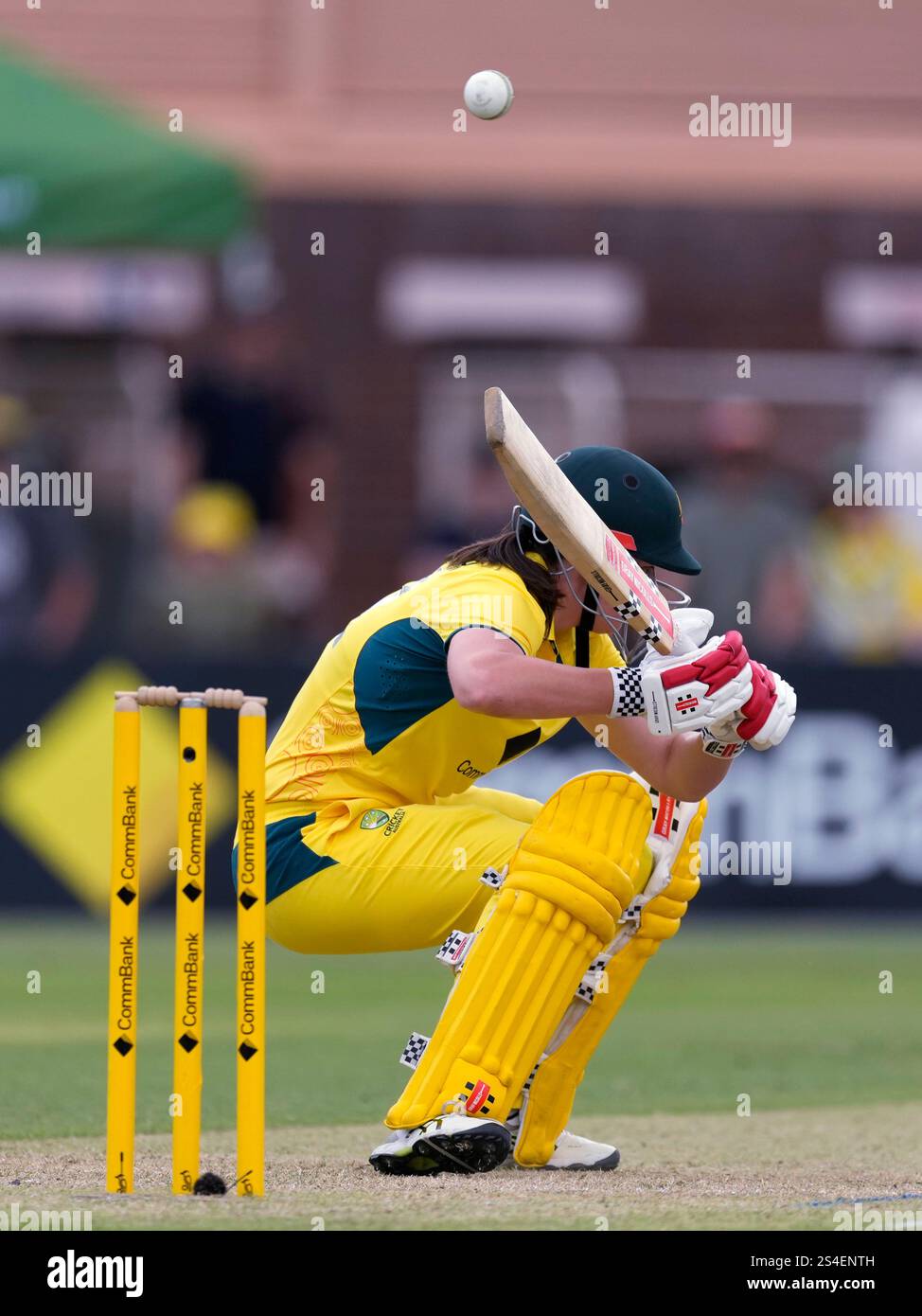 Australia's Tahlia McGrath ducks a bouncer while batting against ...