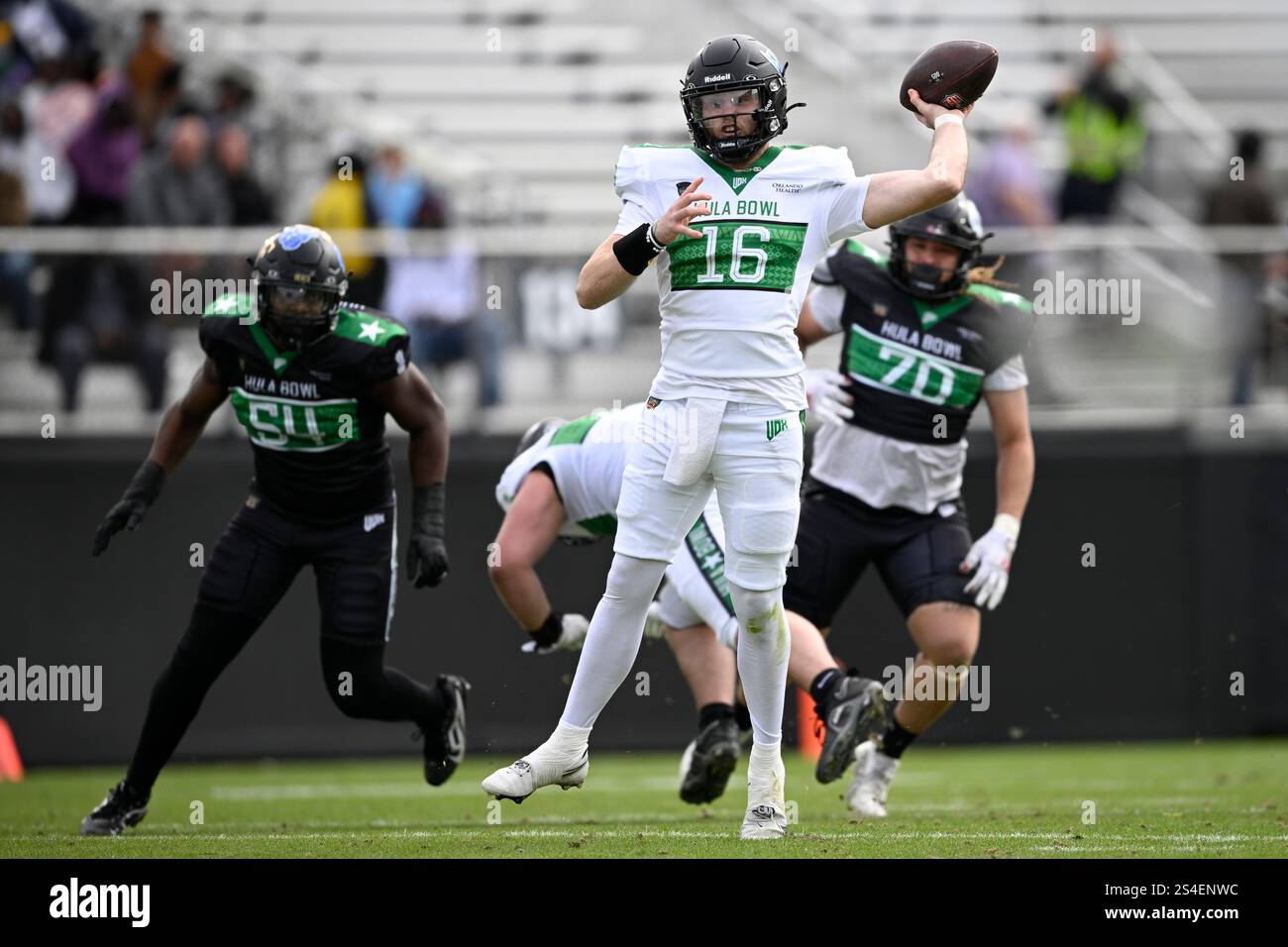 Team Kai quarterback Hunter Dekkers (16), of Iowa Western, throws a