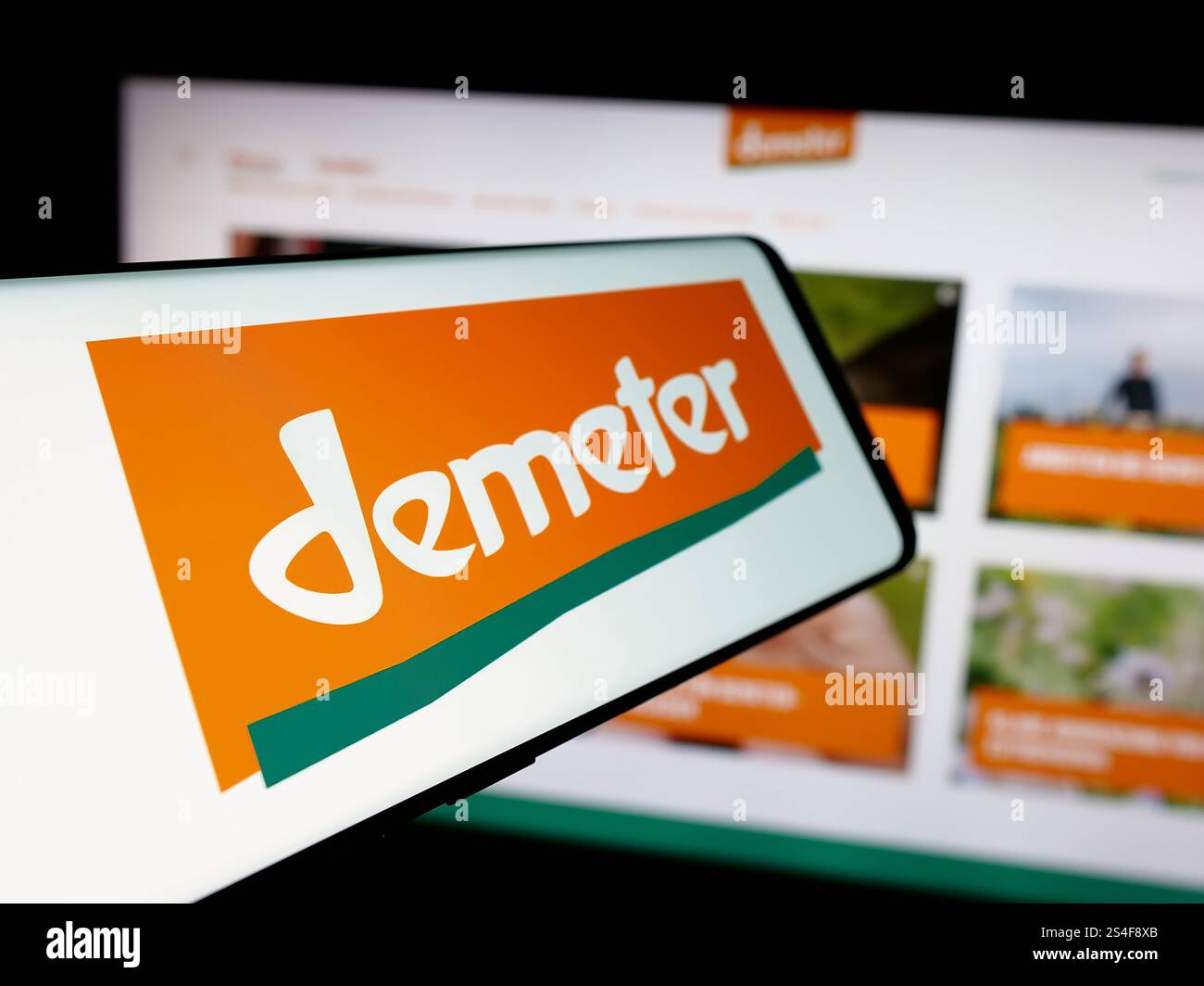 In this photo illustration, a cellphone with the logo of German organic ...