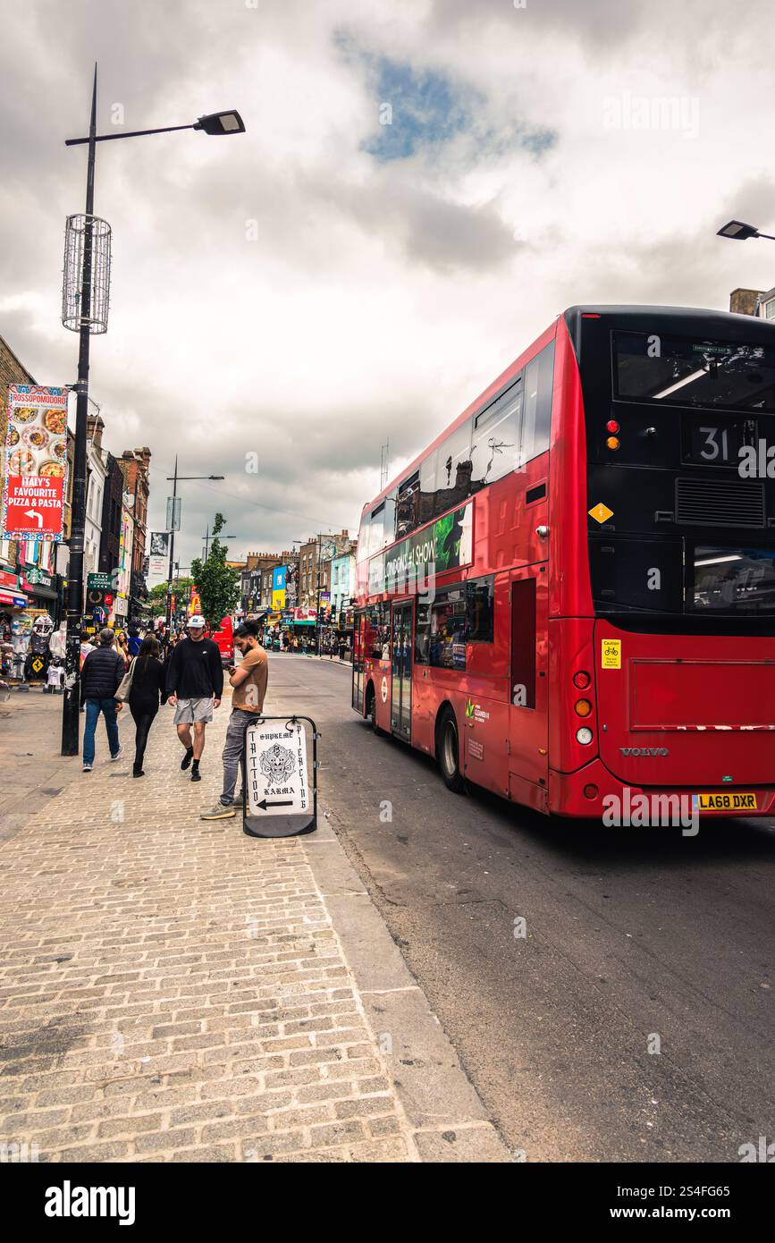A lively scene from the colorful streets of Camden Market in London ...