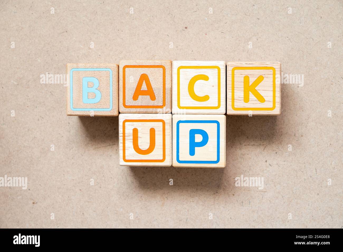 Alphabet letter block in word back up on wood background Stock Photo