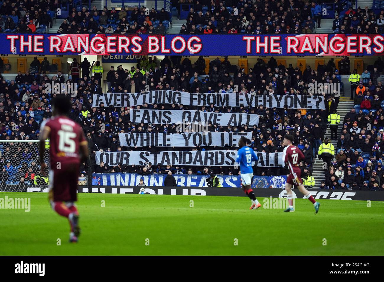 Rangers fans with a banner in the stands aimed at the Rangers board ...