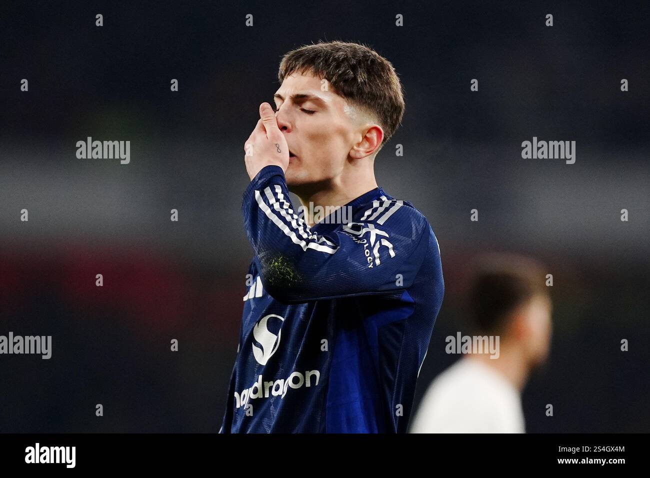 Manchester United's Alejandro Garnacho stands dejected during the