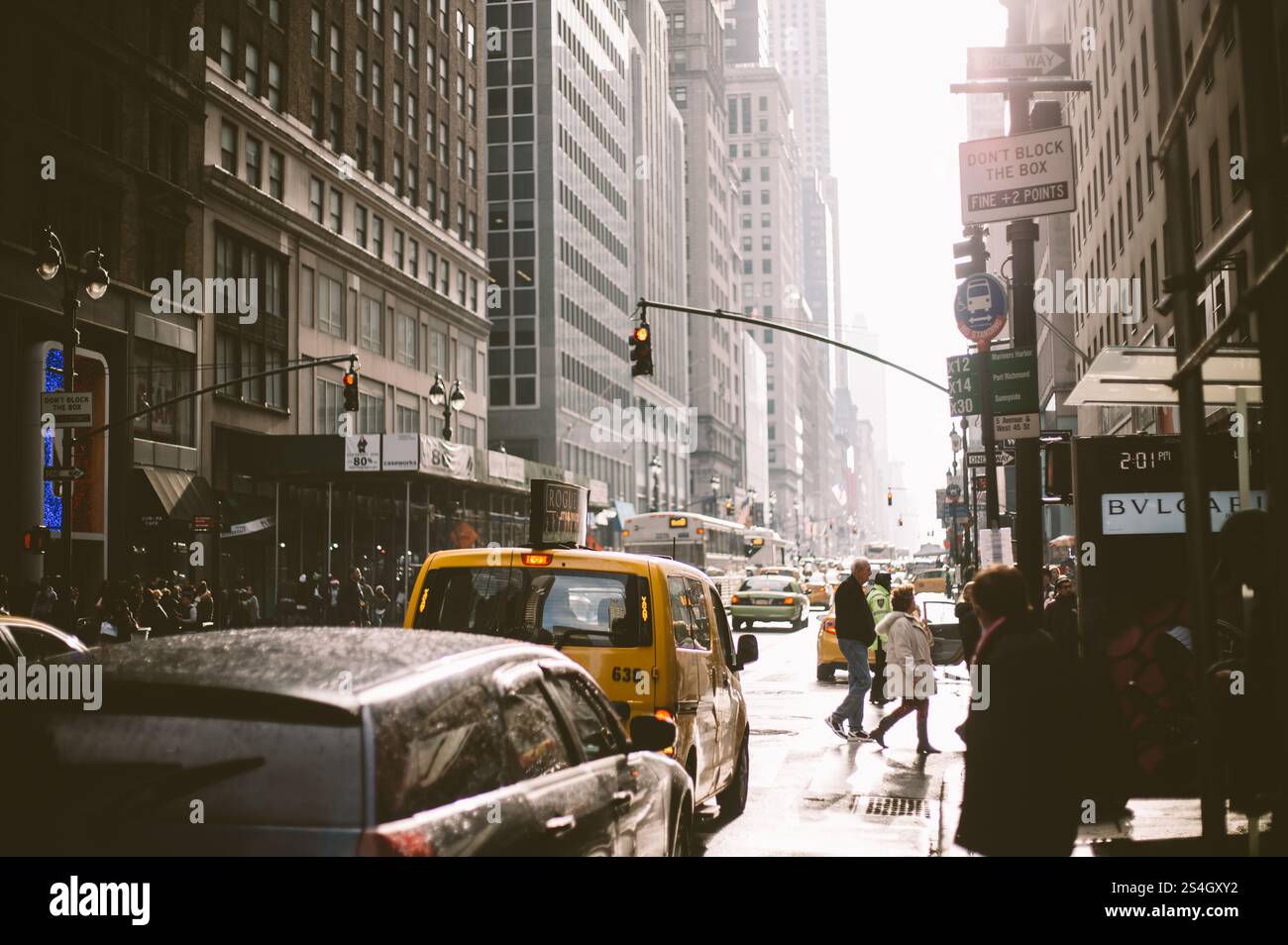 Busy New York City Street with Yellow Taxi and Pedestrians Stock Photo ...