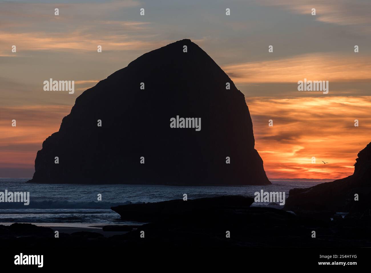 Kiwanda Beach and Haystack Rock at sunset, Oregon. Stock Photo
